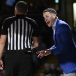 Alabama coach Nate Oats talks to a referee during the first half of the team's NCAA college basketball game against Vanderbilt on Tuesday, Jan. 17, 2023, in Nashville, Tenn. Alabama won 78-66. (AP Photo/John Amis)