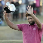 Jon Rahm waves to the gallery after winning the American Express golf tournament on the Pete Dye Stadium Course at PGA West Sunday, Jan. 22, 2023, in La Quinta, Calif. (AP Photo/Mark J. Terrill)