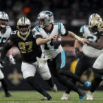 Carolina Panthers quarterback Sam Darnold scrambles during the second half an NFL football game between the Carolina Panthers and the New Orleans Saints in New Orleans, Sunday, Jan. 8, 2023. (AP Photo/Gerald Herbert)