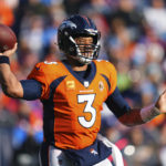 Denver Broncos quarterback Russell Wilson (3) looks to pass against the Los Angeles Chargers during the first half of an NFL football game in Denver, Sunday, Jan. 8, 2023. (AP Photo/Jack Dempsey)