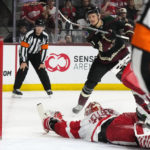 Arizona Coyotes center Nick Bjugstad (17) scores against Detroit Red Wings goaltender Magnus Hellberg during the shootout in an NHL hockey game in Tempe, Ariz., Tuesday, Jan. 17, 2023. The Coyotes won 4-3. (AP Photo/Ross D. Franklin)