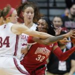 
              Ohio State's Cotie McMahon (32) is defended by Indiana's Grace Berger (34) during the second half of an NCAA college basketball game, Thursday, Jan. 26, 2023, in Bloomington, Ind. (AP Photo/Darron Cummings)
            