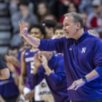 Northwestern head coach Chris Collins gestures during the first half an NCAA college basketball game against Indiana, Sunday, Jan. 8, 2023, in Bloomington, Ind. (AP Photo/Doug McSchooler)