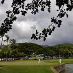 
              Si Woo Kim putts on the third green during the final round of the Sony Open golf tournament, Sunday, Jan. 15, 2023, at Waialae Country Club in Honolulu. (AP Photo/Matt York)
            