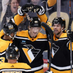 
              Pittsburgh Penguins' Danton Heinen (43) celebrates his goal against the Florida Panthers with Pierre-Olivier Joseph (73) and Ryan Poehling (25) during the first period of an NHL hockey game in Pittsburgh, Tuesday, Jan. 24, 2023. (AP Photo/Gene J. Puskar)
            