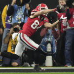 Georgia wide receiver Ladd McConkey (84) makes a touchdown catch against TCU during the second half of the national championship NCAA College Football Playoff game, Monday, Jan. 9, 2023, in Inglewood, Calif. (AP Photo/Mark J. Terrill)