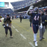 
              Chicago Bears linebacker Matthew Adams walks off the field after an NFL football game against the Minnesota Vikings, Sunday, Jan. 8, 2023, in Chicago. The Vikings won 29-13. (AP Photo/Nam Y. Huh)
            