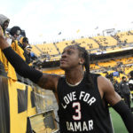 
              Pittsburgh Steelers safety Terrell Edmunds greets fans as he heads to the locker room following an NFL football game against the Cleveland Browns in Pittsburgh, Sunday, Jan. 8, 2023. (AP Photo/Don Wright)
            