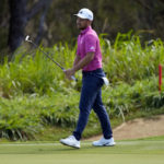 
              Xander Schauffele reacts after his shot on the 14th green during the second round of the Tournament of Champions golf event, Friday, Jan. 6, 2023, at Kapalua Plantation Course in Kapalua, Hawaii. (AP Photo/Matt York)
            