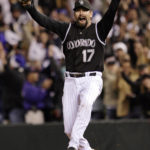 FILE - Colorado Rockies first baseman Todd Helton (17) celebrates after he made the last out to win Game 4 of the National League Championship baseball series against the Arizona Diamondbacks, 6-4, and advance to the World Series, Monday, Oct. 15, 2007, in Denver. Helton, Billy Wagner and Scott Rolen are leading contenders to be elected to baseball's Hall of Fame in the Baseball Writers' Association of America vote announced Tuesday, Jan. 24, 2023.(AP Photo/David Zalubowski, File)
