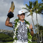 
              Si Woo Kim holds the champions trophy after the final round of the Sony Open golf tournament, Sunday, Jan. 15, 2023, at Waialae Country Club in Honolulu. (AP Photo/Matt York)
            