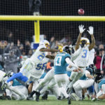 Jacksonville Jaguars place kicker Riley Patterson (10) kicks the game-winning field goal against the Los Angeles Chargers during the second half of an NFL wild-card football game, Saturday, Jan. 14, 2023, in Jacksonville, Fla. Jacksonville Jaguars won 31-30. (AP Photo/John Raoux)