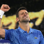 
              Novak Djokovic of Serbia celebrates after defeating Tommy Paul of the U.S. in their semifinal at the Australian Open tennis championship in Melbourne, Australia, Friday, Jan. 27, 2023. (AP Photo/Aaron Favila)
            