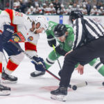 
              Florida Panthers center Eric Staal, left, competes for the puck against Dallas Stars center Roope Hintz, back right, in the first period of an NHL hockey game in Dallas, Sunday, Jan. 8, 2023. (AP Photo/Gareth Patterson)
            