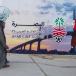 
              People pass by a billboard announcing Arab Gulf Cup in Basra, Tuesday, Jan. 3, 2023. The 25th edition of the Arabian Gulf Cup will be held in the city of Basra, the first time the turmoil-wracked country will host the tournament since 1979. (AP Photo/Nabil al-Jurani)i)
            