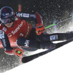 
              Norway's Henrik Kristoffersen speeds down the course during an alpine ski, men's World Cup giant slalom race, in Adelboden, Switzerland, Saturday, Jan. 7, 2023. (AP Photo/Gabriele Facciotti)
            
