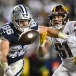 Dallas Cowboys tight end Dalton Schultz (86) missed catching the ball as he is covered by Washington Commanders linebacker David Mayo (51) during the first half an NFL football game, Sunday, Jan. 8, 2023, in Landover, Md. (AP Photo/Nick Wass)