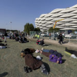 
              Football fans rest outside the Basra International Stadium in Basra, Iraq, Thursday, Jan 19, 2023. A stampede outside the stadium has killed and injured a number of people. (AP Photo/Anmar Khalil)
            