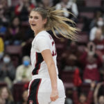 Stanford guard Hannah Jump reacts after scoring a 3-point basket against Utah during the first half of an NCAA college basketball game in Stanford, Calif., Friday, Jan. 20, 2023. (AP Photo/Godofredo A. Vásquez)