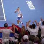 
              Novak Djokovic of Serbia reacts after winning the first set against Tommy Paul of the U.S. during their semifinal at the Australian Open tennis championship in Melbourne, Australia, Friday, Jan. 27, 2023. (AP Photo/Dita Alangkara)
            