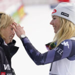 United States' Mikaela Shiffrin, right, winner of an alpine ski, women's World Cup giant slalom race, celebrates with her mother Eileen Shiffrin, in Kranjska Gora, Slovenia, Sunday, Jan. 8, 2023. Shiffrin matched Lindsey Vonn's women's World Cup skiing record with her 82nd win Sunday. (AP Photo/Giovanni Auletta)