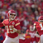 
              Kansas City Chiefs quarterback Patrick Mahomes drops back to pass during the first half of an NFL football game against the Denver Broncos Sunday, Jan. 1, 2023, in Kansas City, Mo. (AP Photo/Charlie Riedel)
            