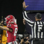 Georgia wide receiver Ladd McConkey (84) celebrates his touchdown against TCU during the second half of the national championship NCAA College Football Playoff game, Monday, Jan. 9, 2023, in Inglewood, Calif. (AP Photo/Mark J. Terrill)
