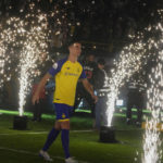 
              Cristiano Ronaldo walks during his official unveiling as a new member of Al Nassr soccer club in in Riyadh, Saudi Arabia, Tuesday, Jan. 3, 2023. Ronaldo, who has won five Ballon d'Ors awards for the best soccer player in the world and five Champions League titles, will play outside of Europe for the first time in his storied career. (AP Photo/Amr Nabil)
            
