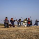 
              A group of local men practice archery on a ridge overlooking the Laitlum Canyon about 20km (12 miles) from Shillong, India, Sunday, Jan. 22, 2023. In villages scattered across the northeastern Indian state of Meghalaya an ancient tradition of archery still continues and regular competitions are held between different localities. (AP Photo/Ashwini Bhatia)
            