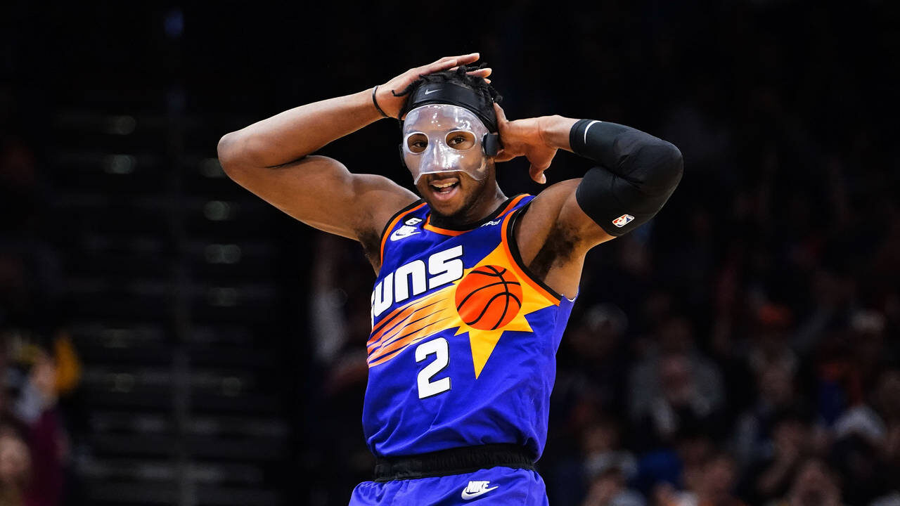 Phoenix Suns' Josh Okogie (2) hams it up after making a 3-pointer against the Indiana Pacers during...