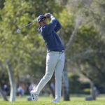
              Davis Thompson hits from the 15th tee during the American Express golf tournament on the La Quinta Country Club Course Thursday, Jan. 19, 2023, in La Quinta, Calif. (AP Photo/Mark J. Terrill)
            
