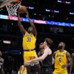 Los Angeles Lakers center Thomas Bryant (31) shoots during the first half of an NBA basketball game Sacramento Kings in Los Angeles, Wednesday, Jan. 18, 2023. (AP Photo/Ashley Landis)