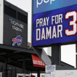A sign shows support for injured Buffalo Bills NFL football player Damar Hamlin outside Highmark Stadium in Orchard Park, N.Y., Thursday Jan. 5, 2023. (AP Photo/Jeffrey T. Barnes)
