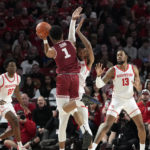 
              Temple's Damian Dunn (1) is fouled by Houston's Reggie Chaney as he shoots during the first half of an NCAA college basketball game Sunday, Jan. 22, 2023, in Houston. (AP Photo/David J. Phillip)
            