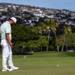 
              J.J. Spaun watches his putt miss the cup on the 18th green during the third round of the Sony Open golf tournament, Saturday, Jan. 14, 2023, at Waialae Country Club in Honolulu. (AP Photo/Matt York)
            