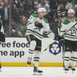 Dallas Stars left wing Jason Robertson (21) celebrates after scoring during the second period of an NHL hockey game against the Los Angeles Kings Thursday, Jan. 19, 2023, in Los Angeles. (AP Photo/Ashley Landis)