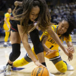 
              Stanford guard Haley Jones, left, and California guard Leilani McIntosh (1) vie for the ball during the first half of an NCAA college basketball game, Sunday, Jan. 8, 2023, in Berkeley, Calif. (AP Photo/D. Ross Cameron)
            