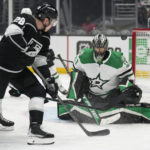 Dallas Stars goaltender Scott Wedgewood (41) stops a shot by Los Angeles Kings center Jaret Anderson-Dolan (28) during the second period of an NHL hockey game Thursday, Jan. 19, 2023, in Los Angeles. (AP Photo/Ashley Landis)