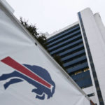 A Buffalo Bills logo is displayed near Buffalo General Medical Center, Monday, Jan. 9, 2023, in Buffalo, N.Y. Bills safety Damar Hamlin was discharged from the University of Cincinnati Medical Center, Monday, and flown to Buffalo, where he will continue his recovery at Buffalo General Medical Center/Gates Vascular Institute after going into cardiac arrest and having to be resuscitated on the field during a game in Cincinnati. (AP Photo/Joshua Bessex)