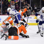 
              Toronto Maple Leafs' Zach Aston-Reese (12) scores a goal past Philadelphia Flyers goaltender Carter Hart (79) during the first period of an NHL hockey game, Sunday, Jan. 8, 2023, in Philadelphia. (AP Photo/Derik Hamilton)
            