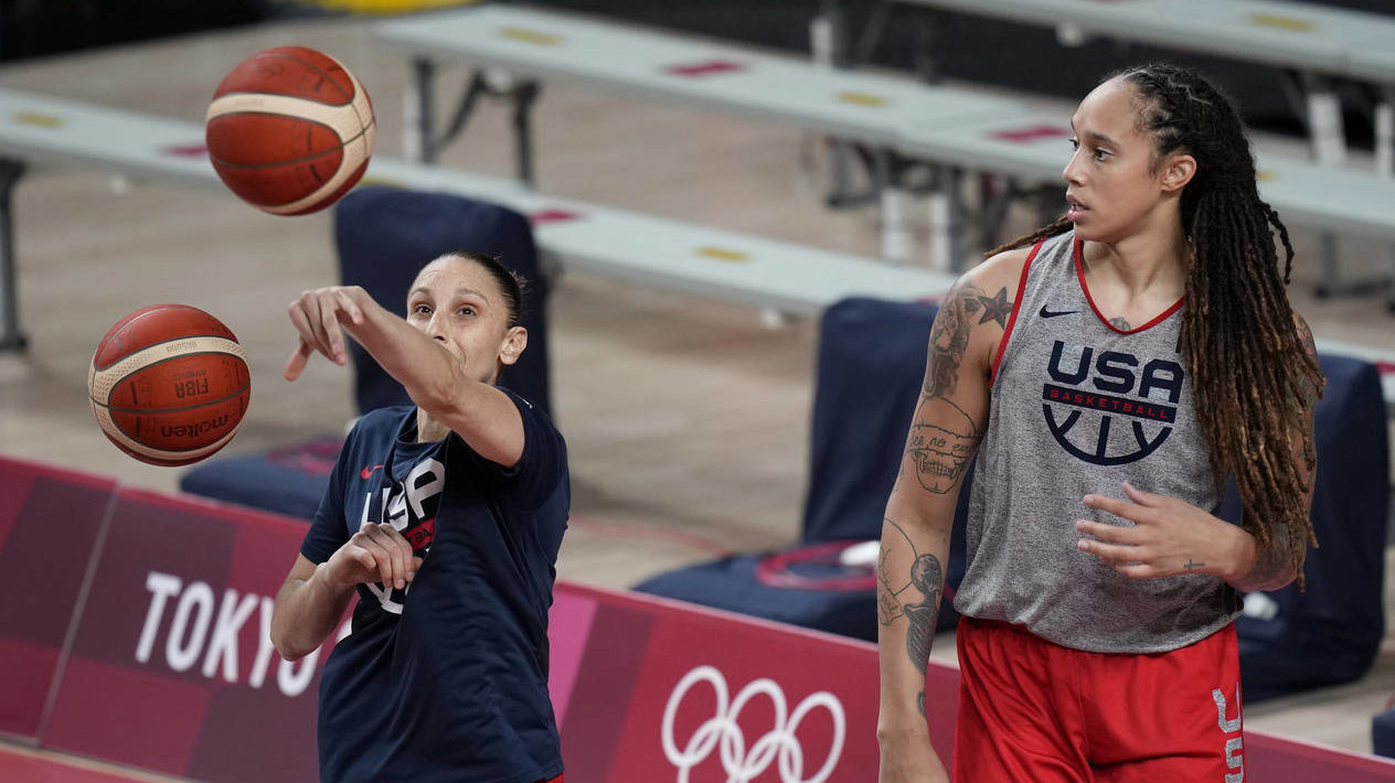 United States' Diana Taurasi, left, and Brittney Griner take part in a women's basketball practice ...