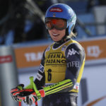 
              United States' Mikaela Shiffrin smiles at the finish area of an alpine ski, women's World Cup super-G, in Cortina d'Ampezzo, Italy, Sunday, Jan. 22, 2023. (AP Photo/Alessandro Trovati)
            
