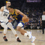 
              Golden State Warriors guard Jordan Poole, right, tries to get past Memphis Grizzlies forward Dillon Brooks during the first half of an NBA basketball game in San Francisco, Wednesday, Jan. 25, 2023. (AP Photo/Godofredo A. Vásquez)
            