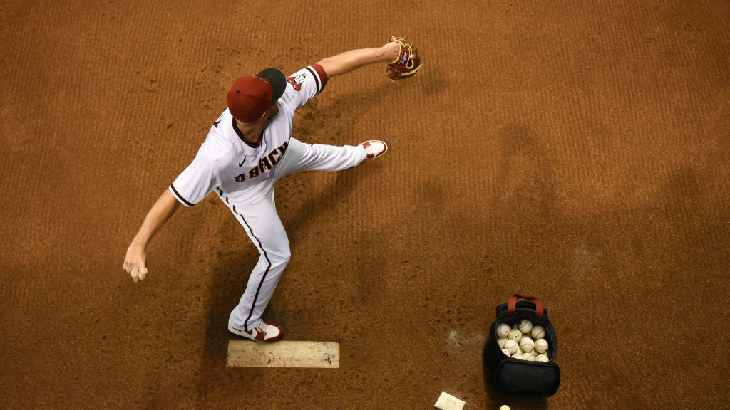 Merrill Kelly #29 of the Arizona Diamondbacks warms up in the bullpen prior to the MLB game against...