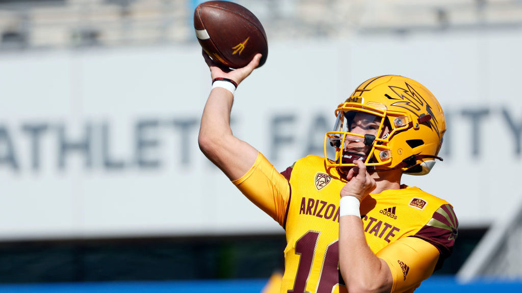 Quarterback Trenton Bourguet #16 of the Arizona State Sun Devils warms up before the game against t...