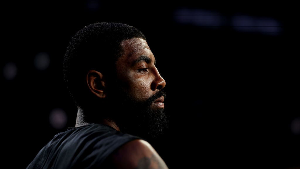 Kyrie Irving #11 of the Brooklyn Nets looks on against the Boston Celtics during their game at Barc...