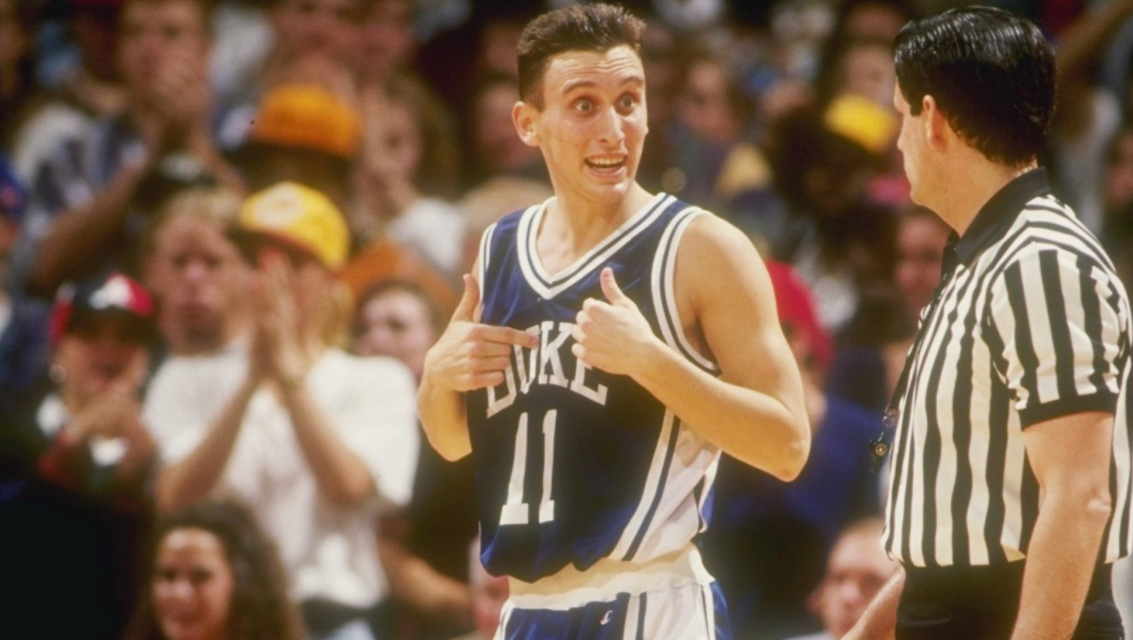Guard Bobby Hurley of the Duke Bluie Devils confers with a referee during a game against the Florid...