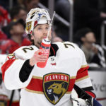 
              Florida Panthers goaltender Sergei Bobrovsky sprays water during a break in the second period of the team's NHL hockey game against the Washington Capitals, Thursday, Feb. 16, 2023, in Washington. (AP Photo/Nick Wass)
            