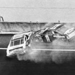 
              FILE - Donnie Allison (1) and Cale Yarborough (11) crash on the last lap of the Daytona 500 in Daytona Beach, Fla., Feb. 18, 1979. (AP Photo/Ric Feld, File)
            