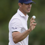 
              Billy Horschel holds up his ball after finishing the third hole during the first round of the Honda Classic golf tournament, Thursday, Feb. 23, 2023, in Palm Beach Gardens, Fla. (AP Photo/Rebecca Blackwell)
            
